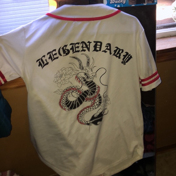 White jersey A couple of brown stains but could be fixed with bleach. - Picture 3 of 3